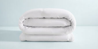 Duvet blanco enrrollado