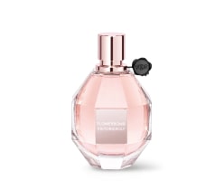 Imagen de un frasco de perfume color durazno