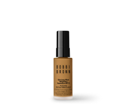 Imagen de un frasco de base de maquillaje para el rostro, BOBBI BROWN BASES