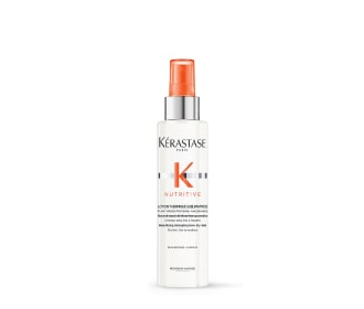 sparay blanco con tapa naranja de la marca kerastase