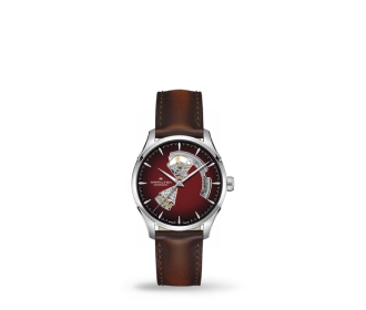 Reloj plateado con extensible cafe de piel. HAMILTON