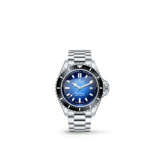 reloj plateado con caratula azul con negro. EDOX