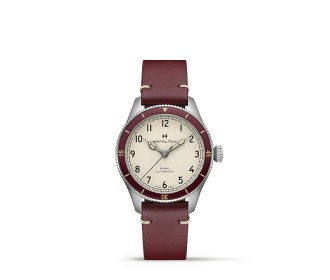 Reloj con correa cafe  y caratula beige. HAMILTON