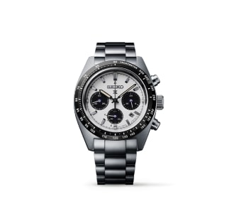 reloj gris con caratula blanca y detalles negros, SEIKO