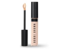 Imagen de un corrector rosa con tapa negra, BOBBI BROWN CORRECTORES