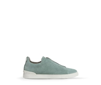 Imagen de un tenis color verde