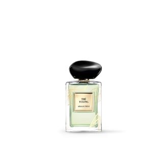 Imagen de un frasco de perfume color verde, ARMANI