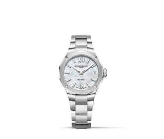 Imagen de reloj plateado . BAUME & MERCIER