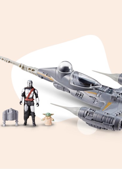 Muñeco de mandalorian con grogu y nave