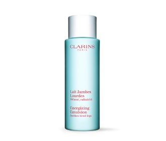 Imagen de botella azul con tapa blanca, CLARINS