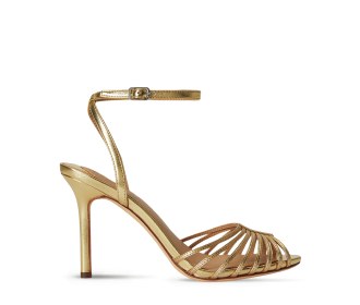 Imagen de una zapatilla color dorada
