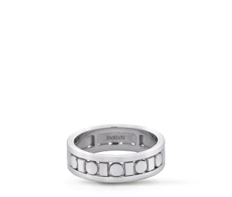 anillo plateado con detalles en forma de circulos, Alta joyería