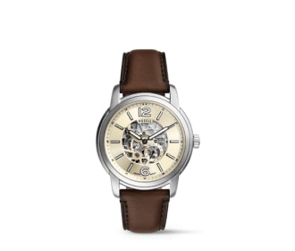 Reloj plateadop con caratula  hueso y correa cafe Fossil