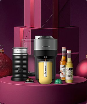 Imagen de una cafetera de color negra de la marca NESPRESSO banner menu