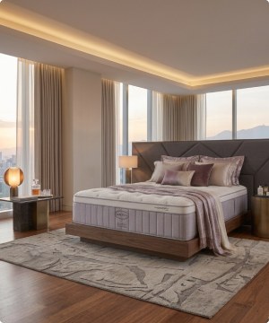 Imagen de una cama con colchon blanco de la marca AMÉRICA, banner menu