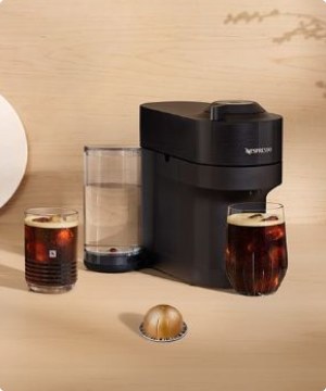Imagen de una cafetera color negra de la marca NESPRESSO, banner menu