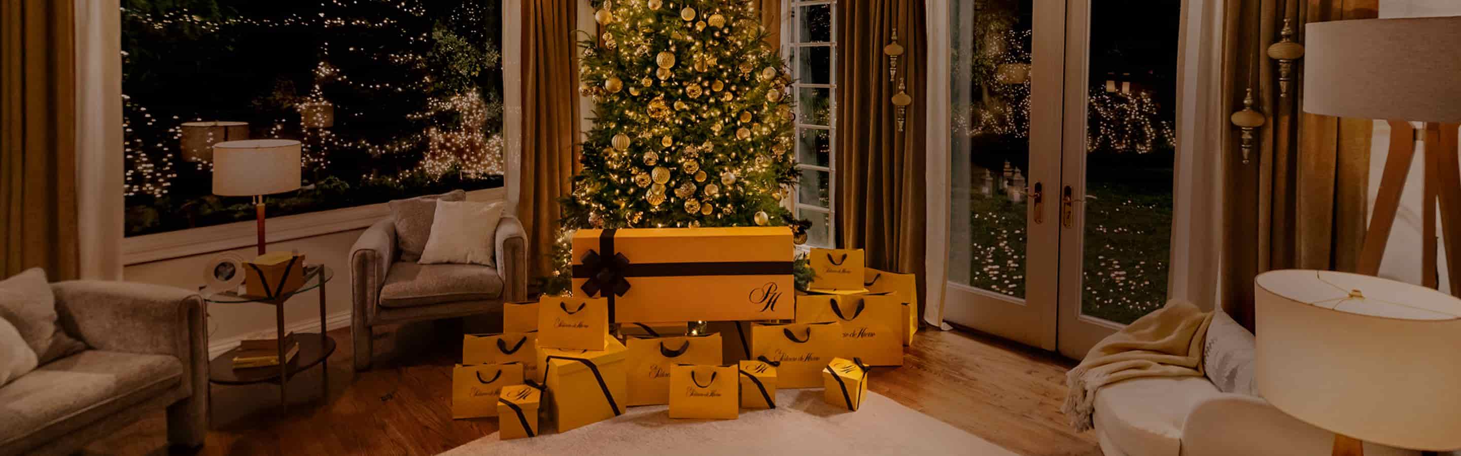 Imagen de arbol de navidad con cajas de regalo palacio de hierro hasta 30% de descuento + 12 mensualidades sin intereses + envio gratis palacio de la navidad 2025