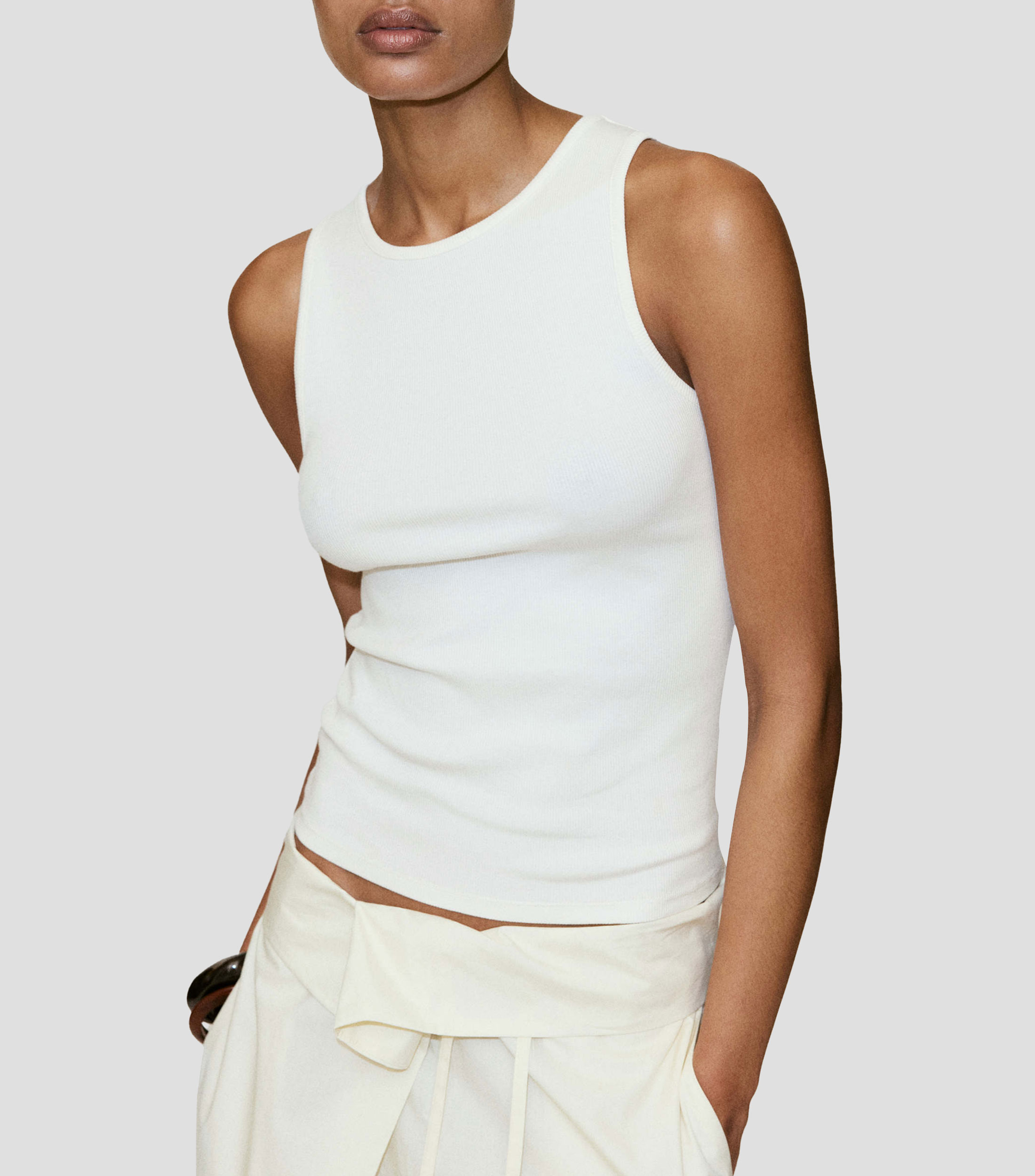 Blusa lisa sin mangas Mujer