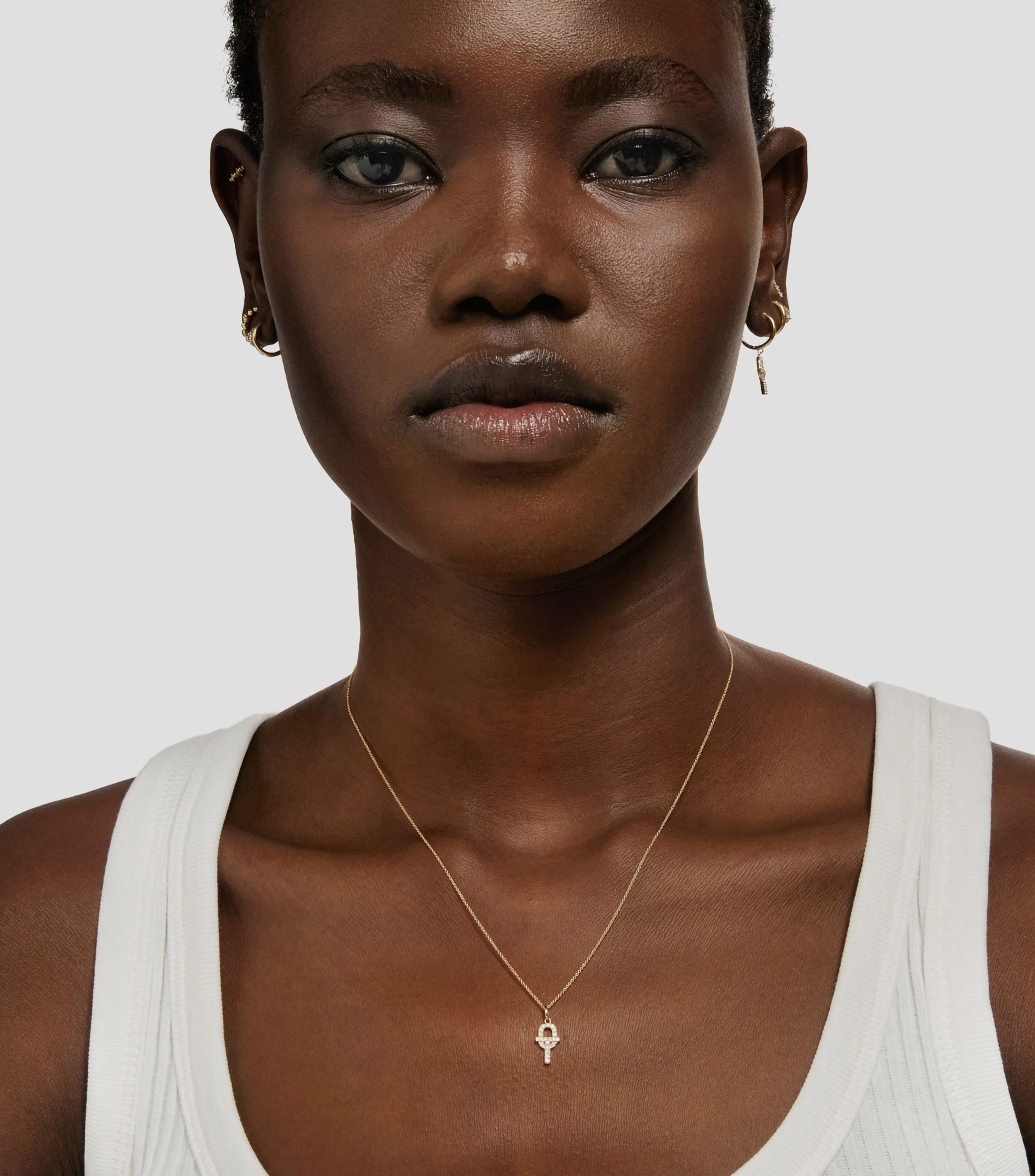 Collar con dije en oro amarillo de 18 kilates con diamantes Manifesto Mujer