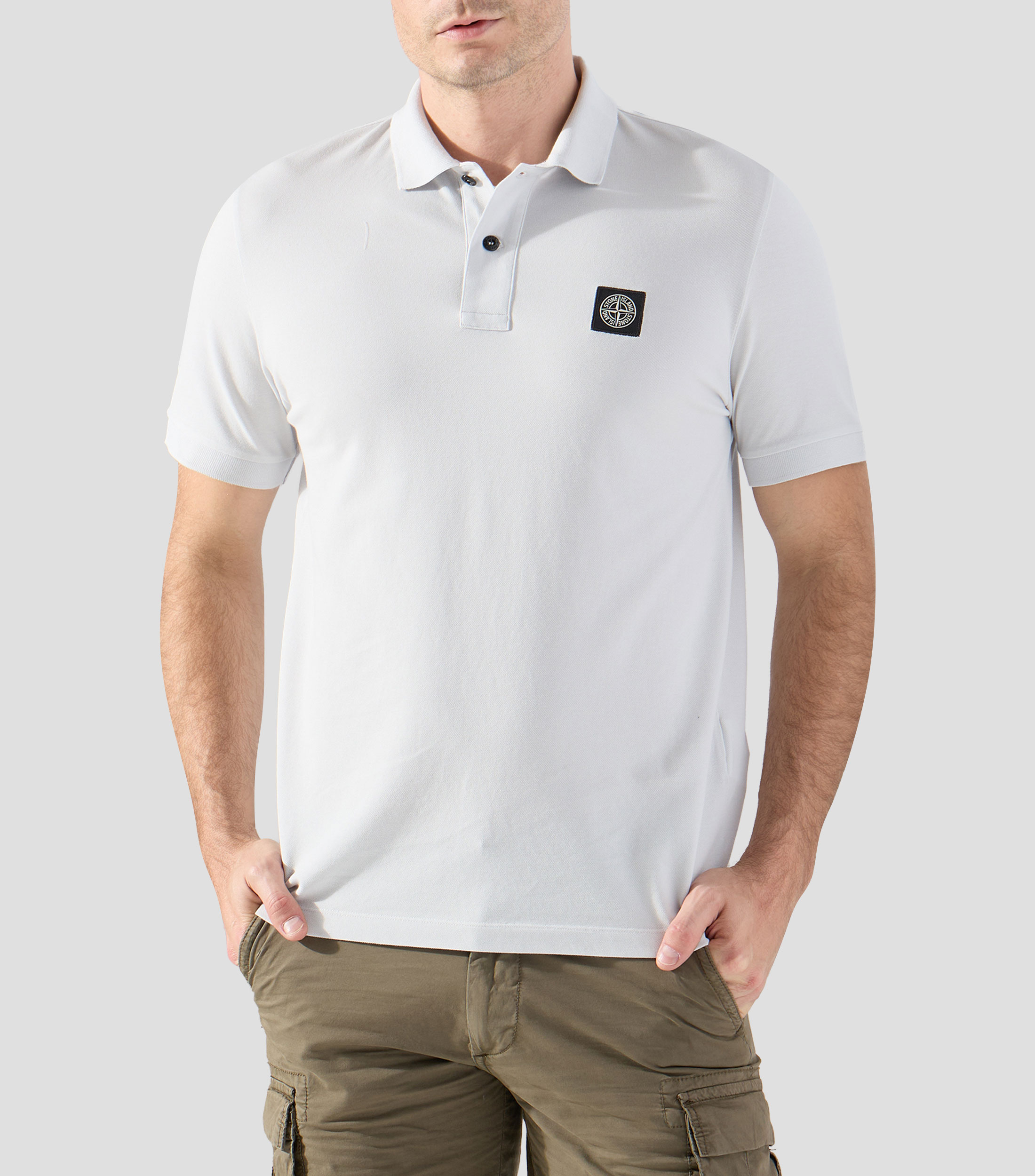 Playera tipo polo con manga corta lisa Hombre