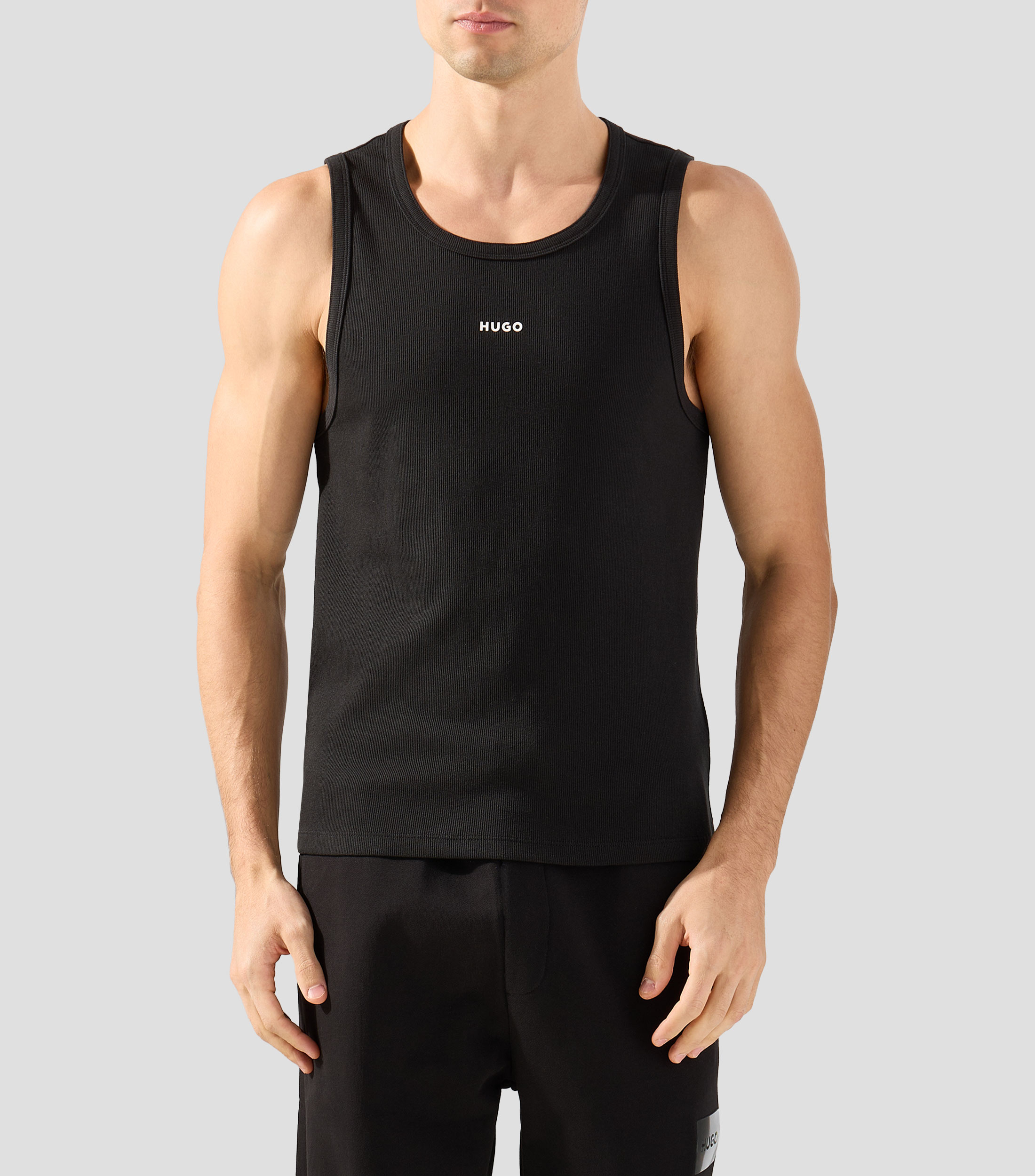 Playera cuello redondo sin mangas lisa Hombre