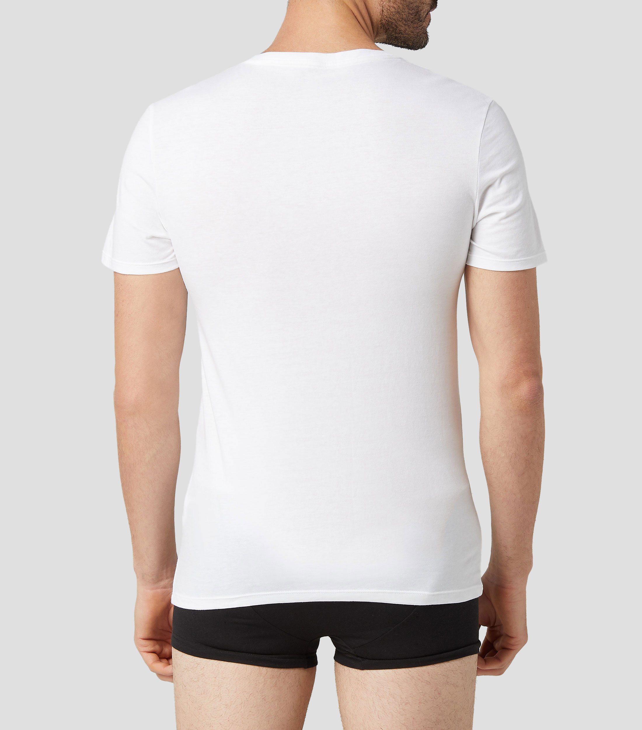 Playera de cuello V con manga corta y lisa Hombre