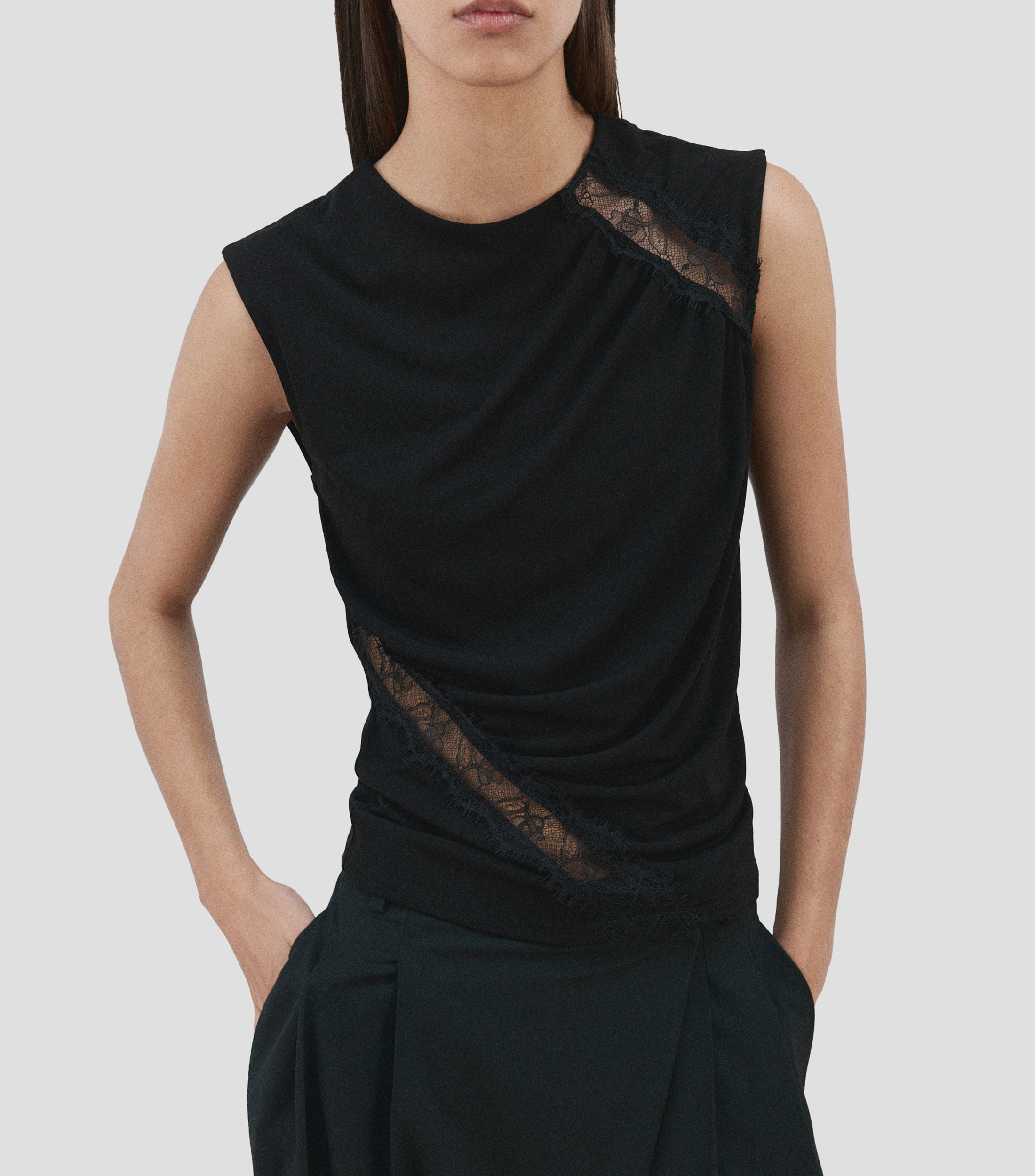 Blusa fantasía sin mangas Mujer