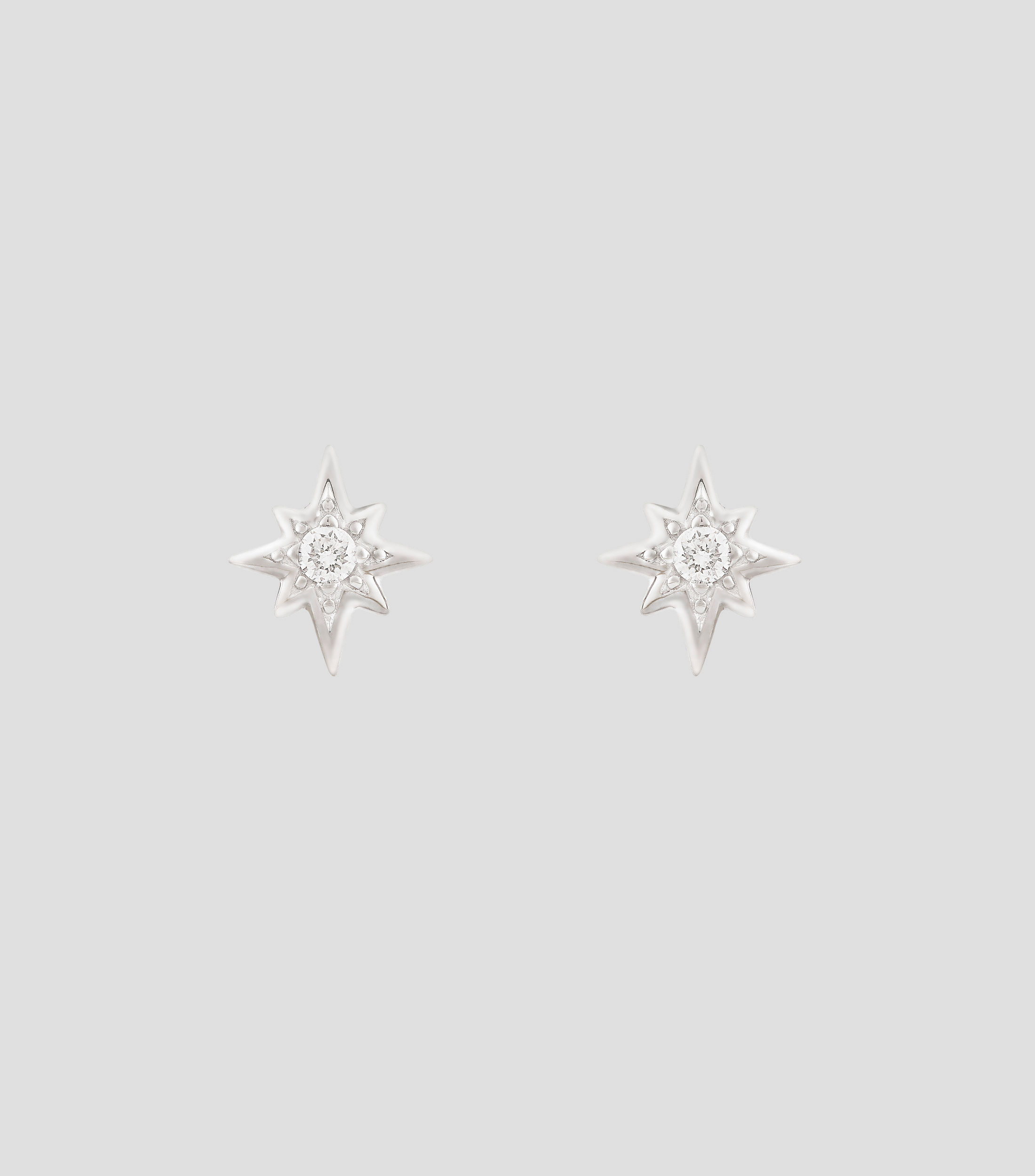Aretes en oro blanco de 18 kilates con forma de estrella y diamantes MyCollection Caress Mujer