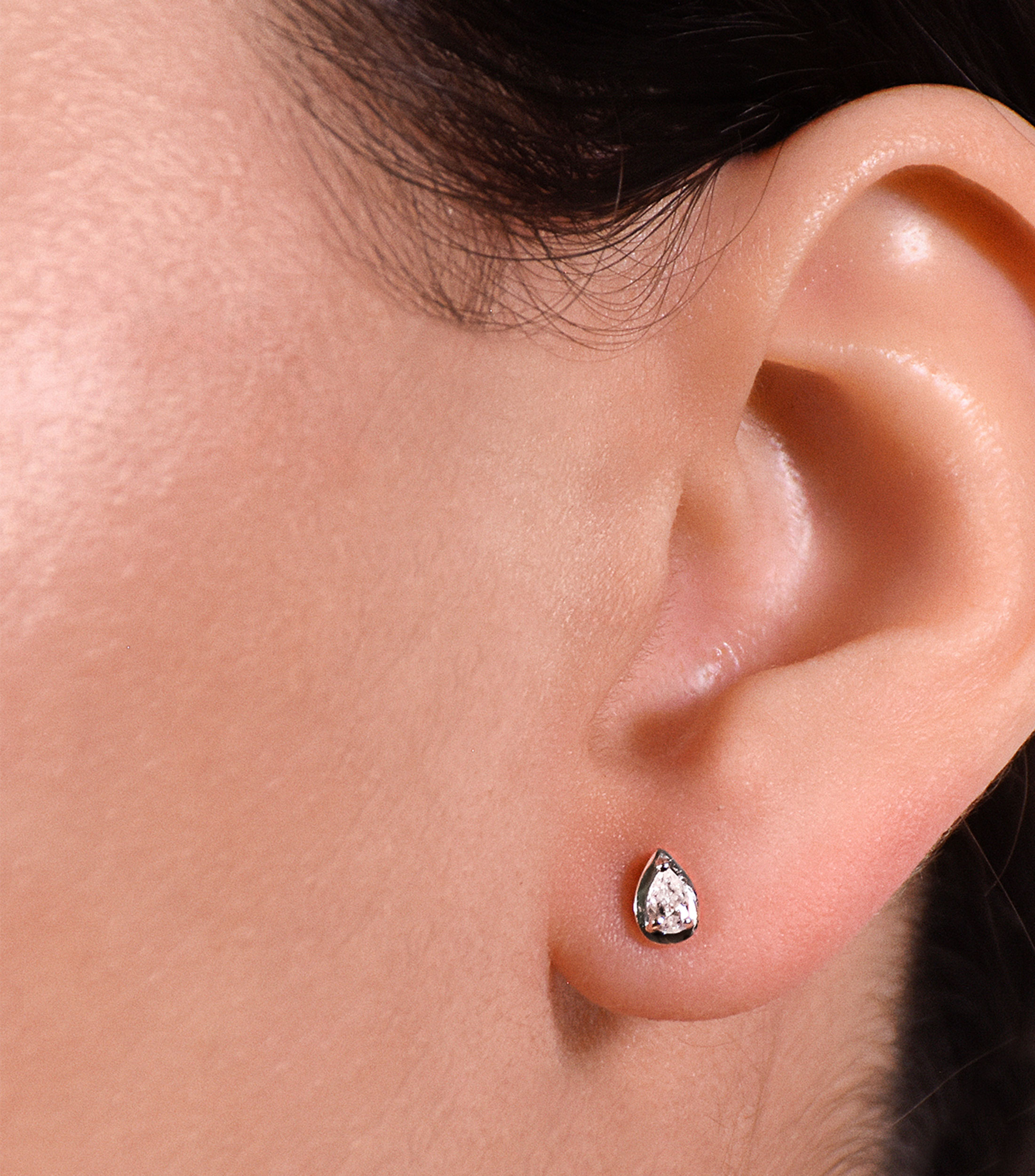 Broqueles en Oro blanco de 18 Kilates con diamantes Mujer