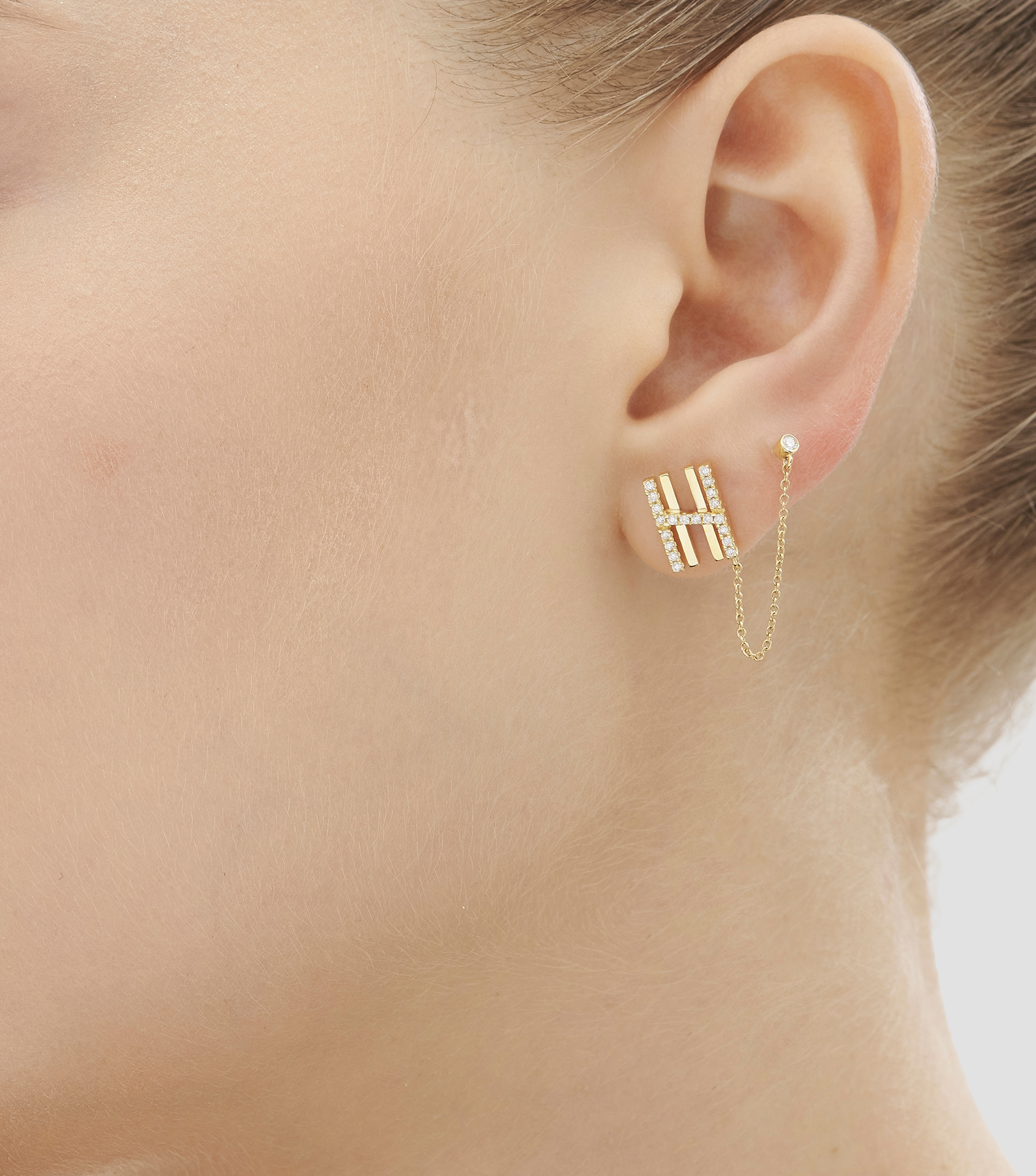 Arete en oro amarillo de 18 kilates con diamantes Mujer