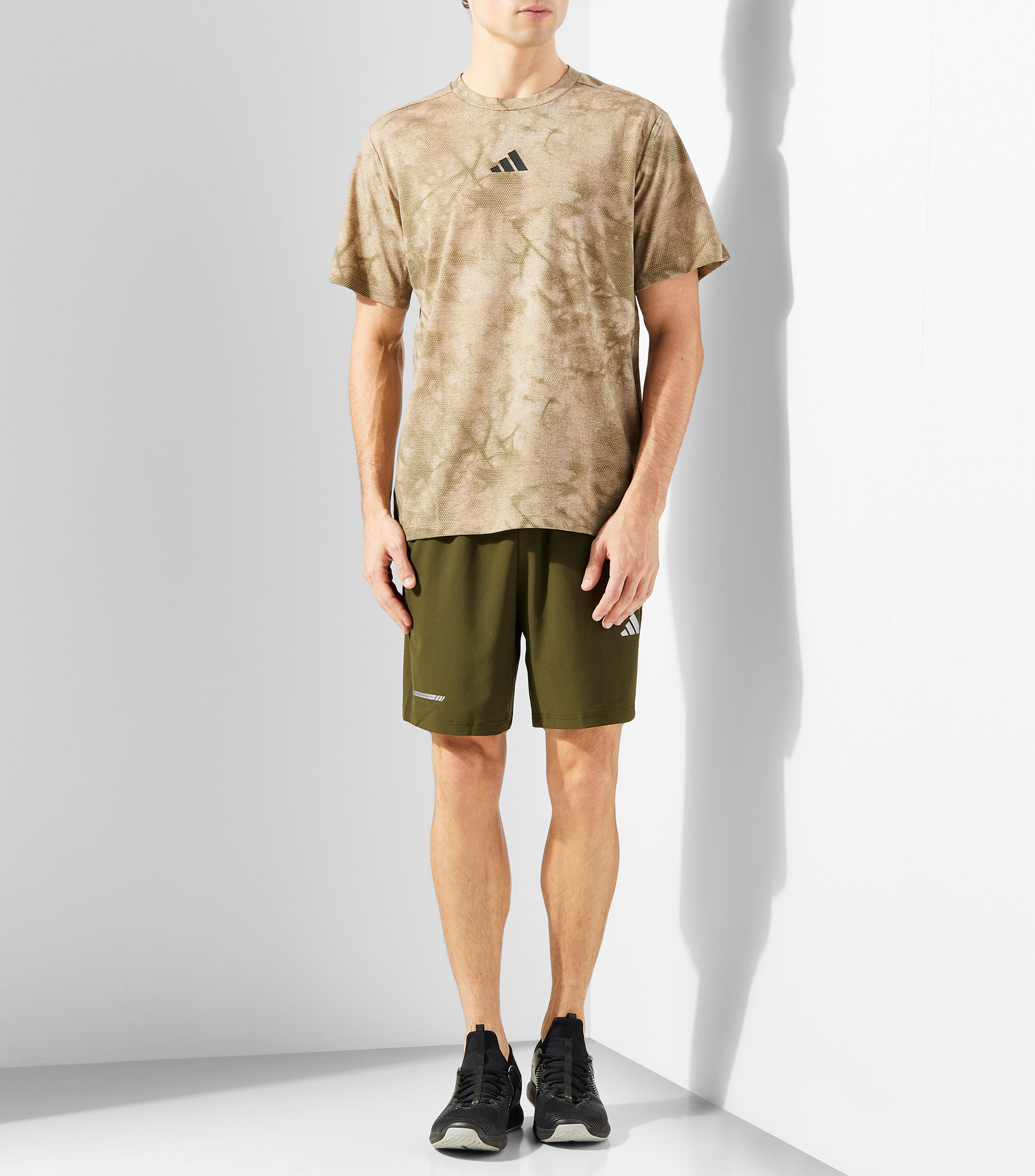 Playera de entrenamiento cuello redondo de manga corta estampada Hombre