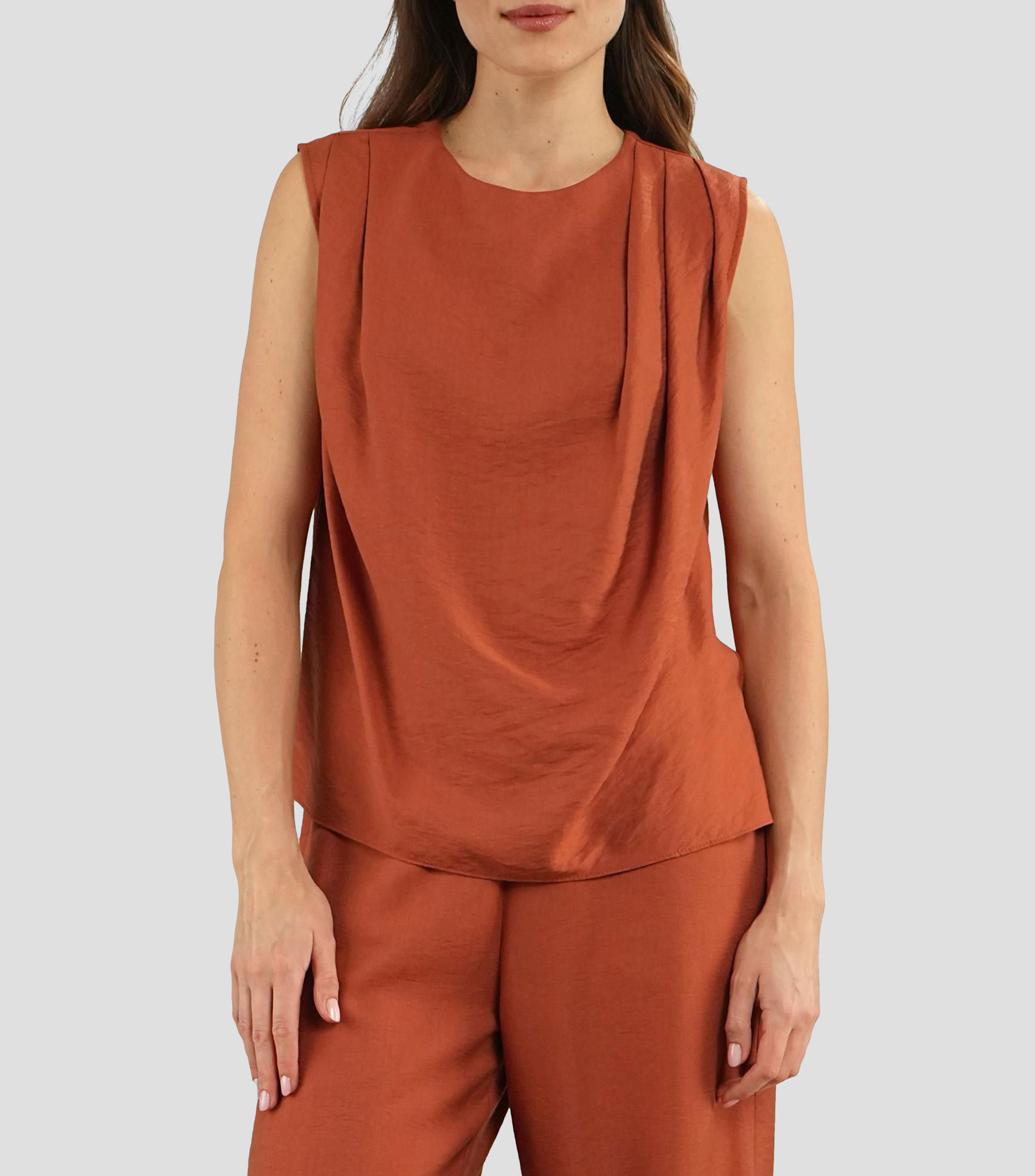 Blusa lisa sin mangas Mujer