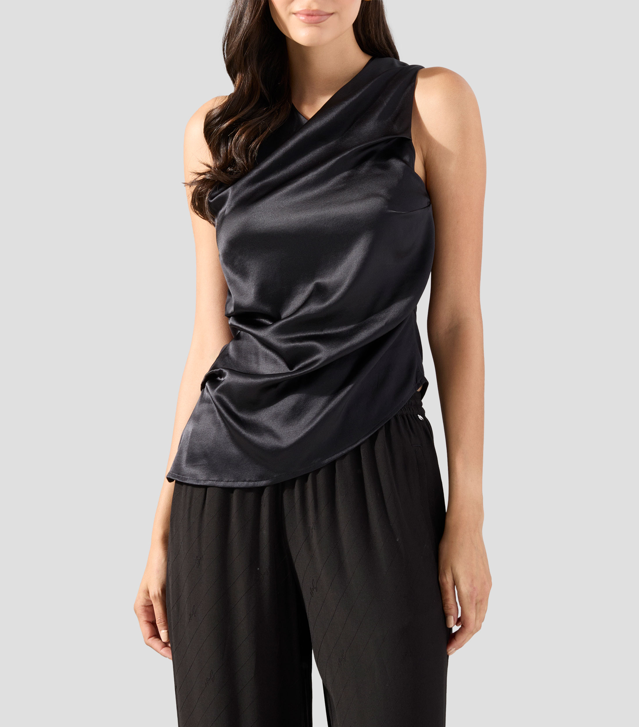 Blusa lisa sin mangas Mujer