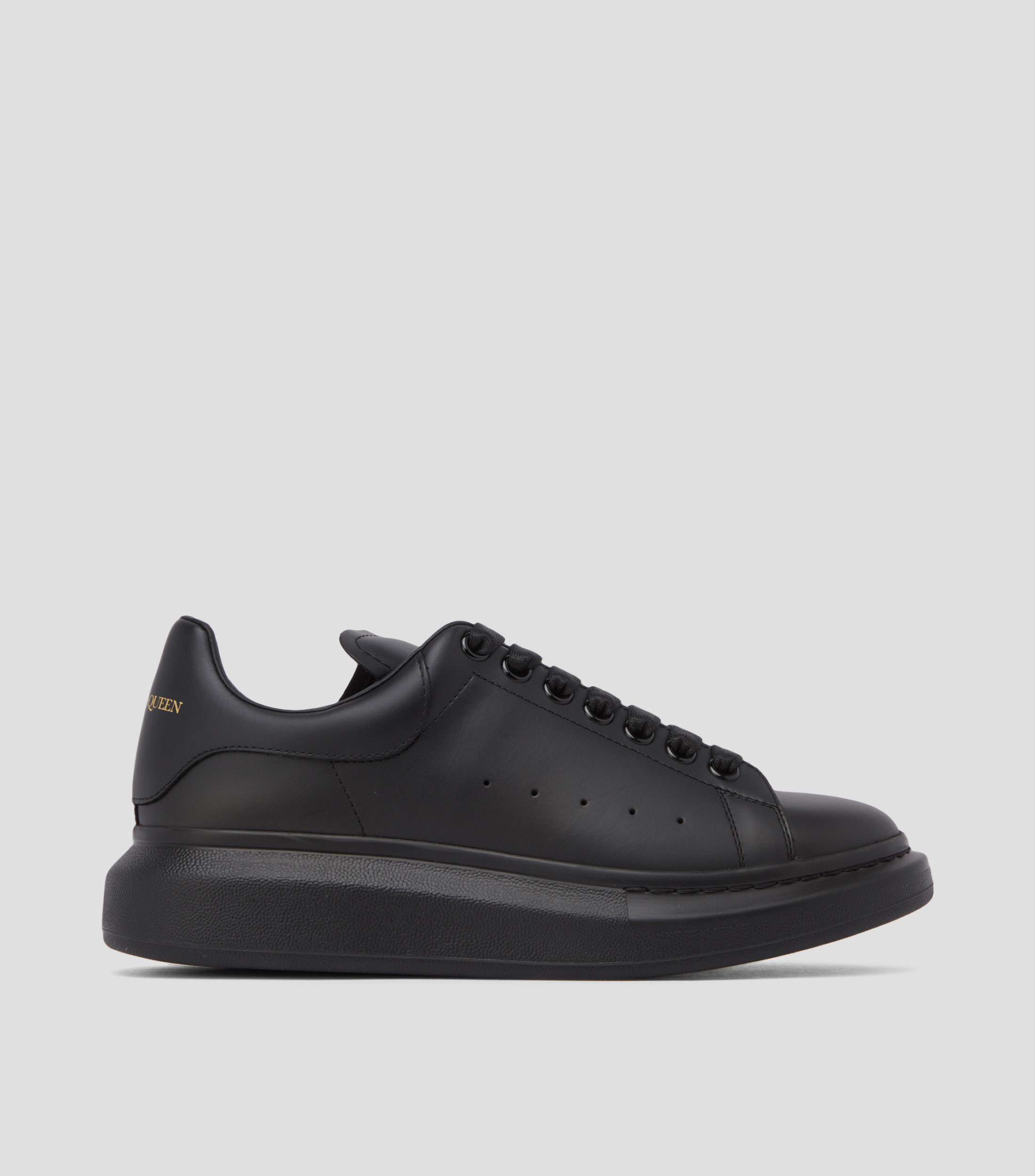Tenis de piel con logotipo en talon Hombre
