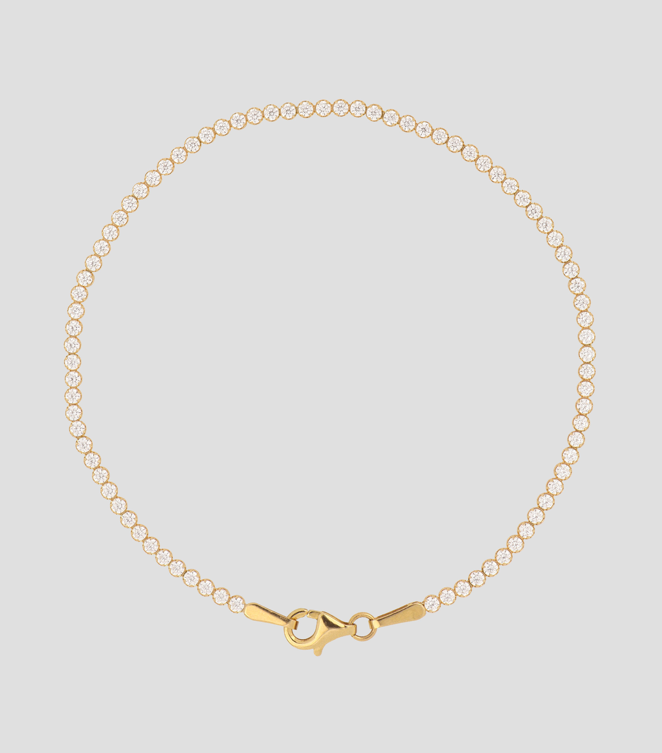 Pulsera en oro de 14 kilates con circonias Mujer