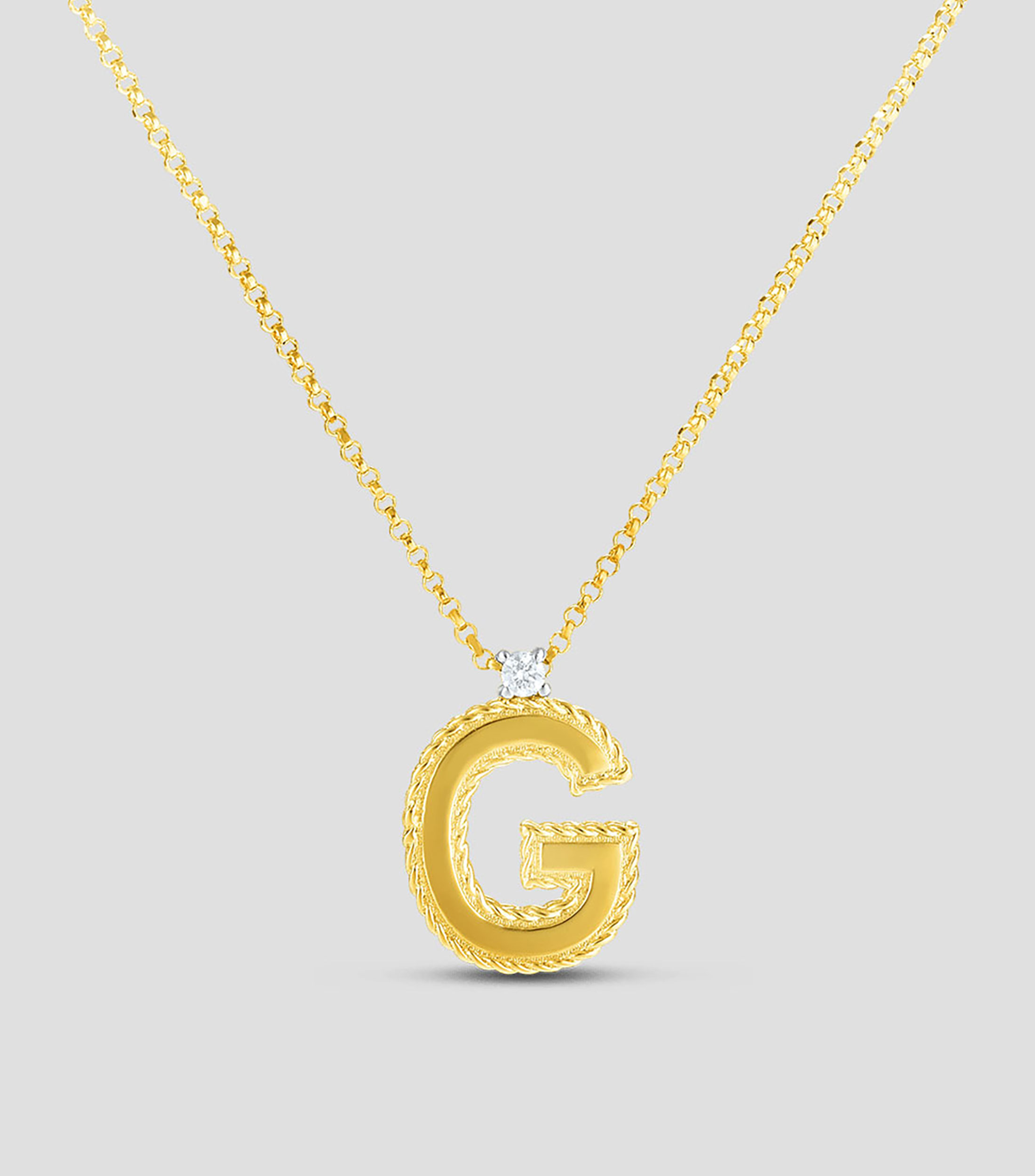 Collar letra "G" en oro amarillo de 18 Kilates con diamante Princess Mujer