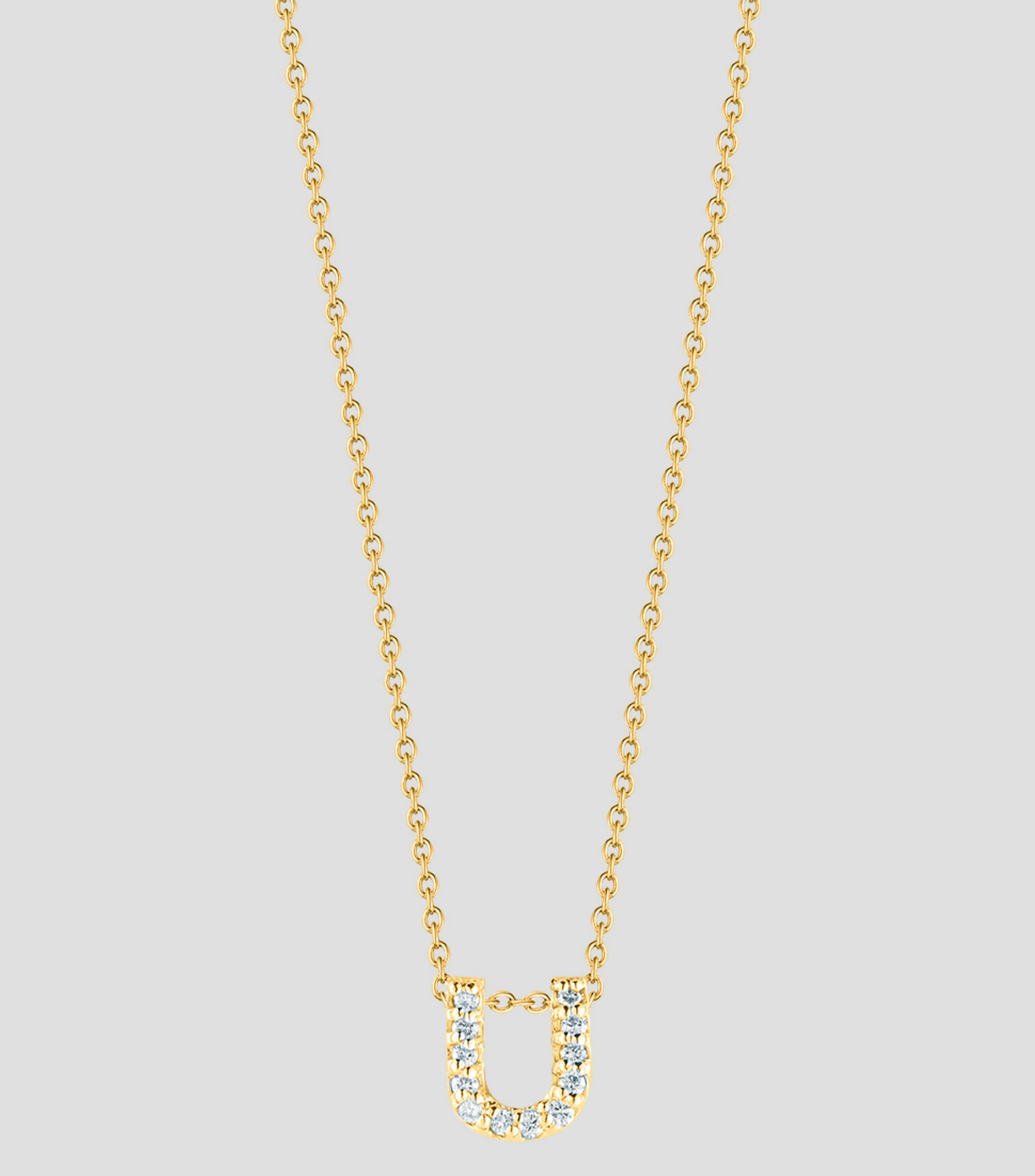 Collar en oro amarillo 18 Kilates letra U con diamantes Mujer