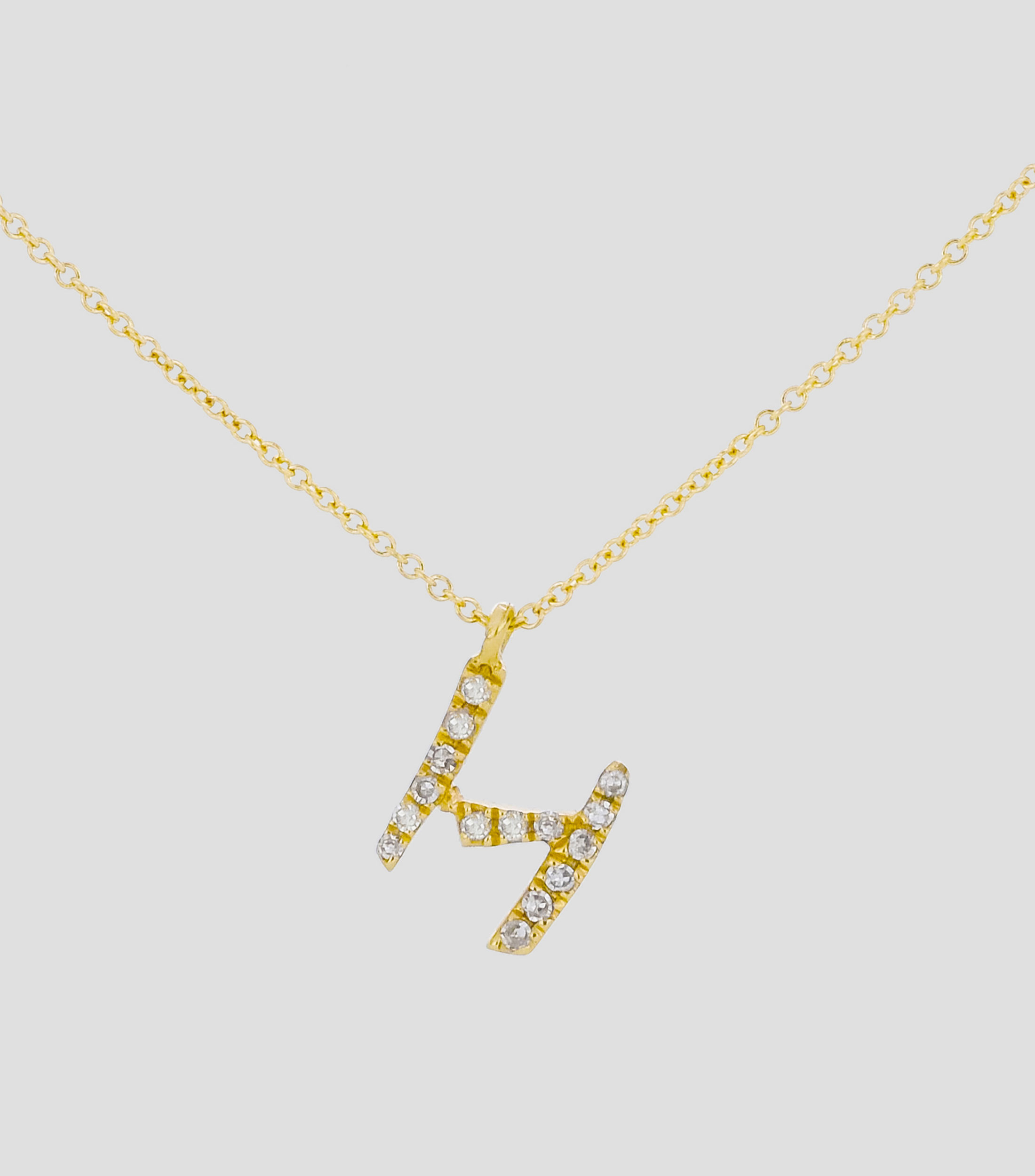Dije en letra "H" y cadena en Oro amarillo 14 Kts Mujer