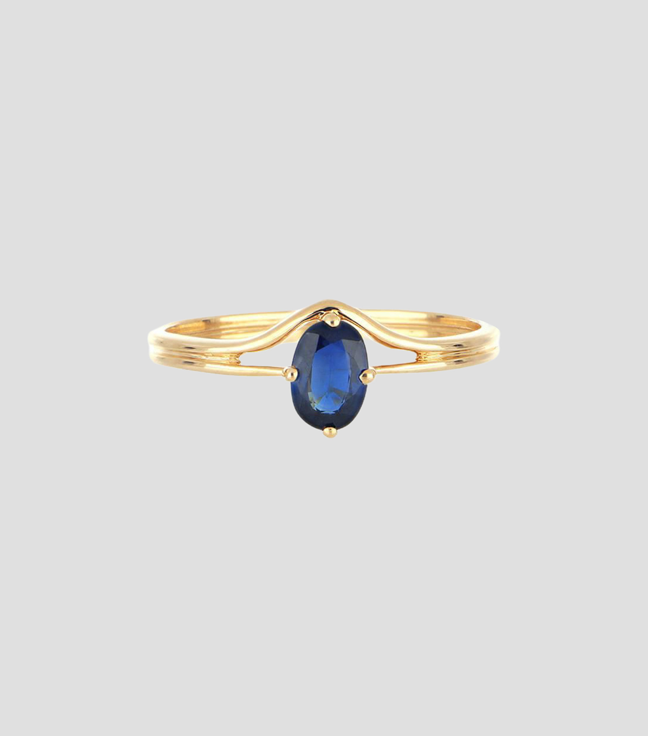 Anillo en oro amarillo de 18 kilates con incrustación de zafiro Mujer