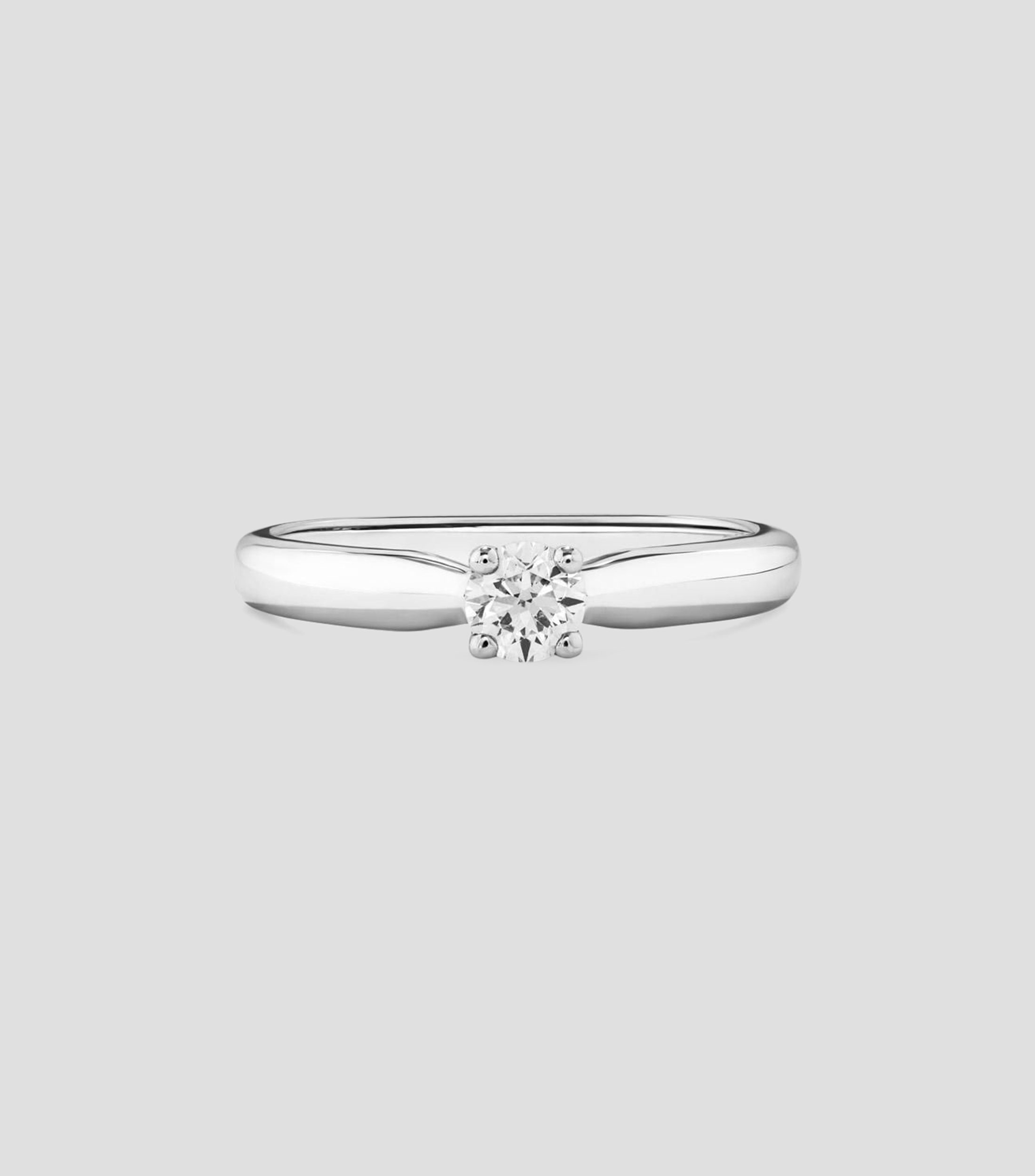 Anillo solitario en Oro blanco de 18 Kilates con diamante Mujer