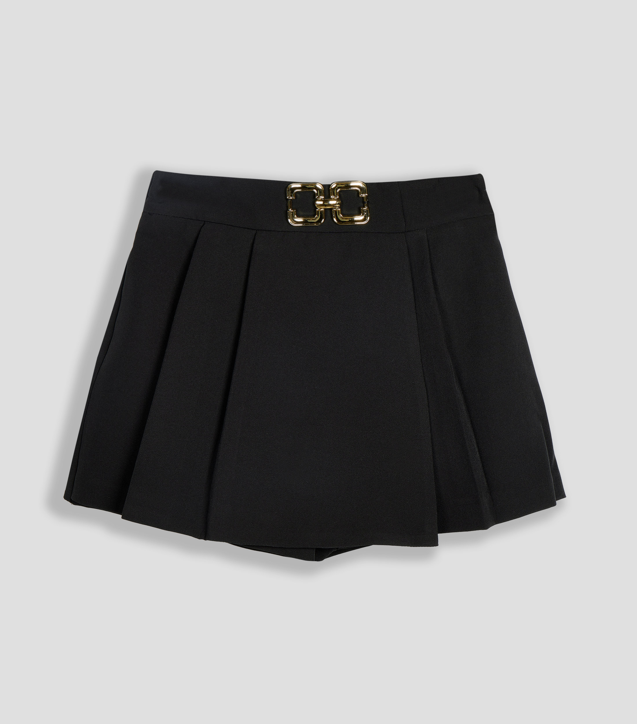 Falda short corta de corte recto lisa Niña