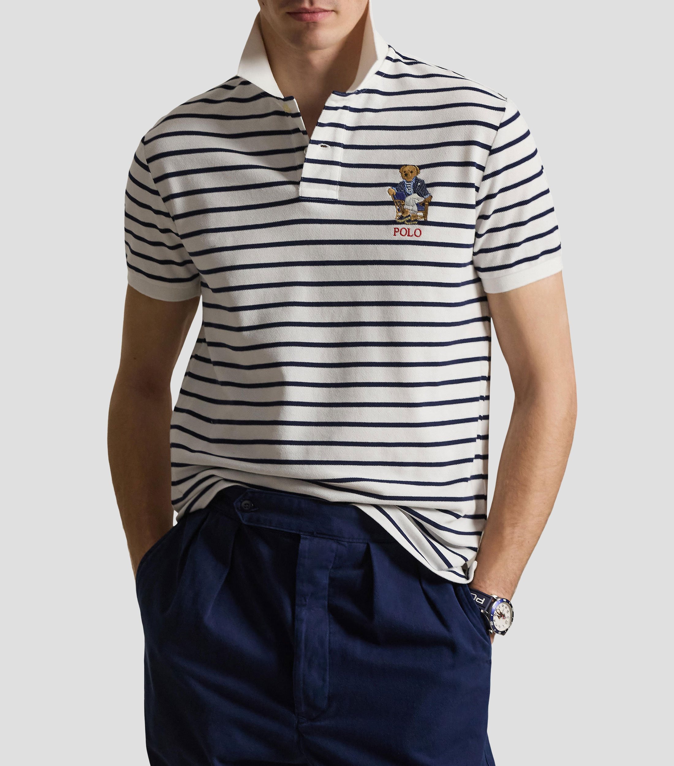 Playera tipo polo con manga corta y rayas Hombre