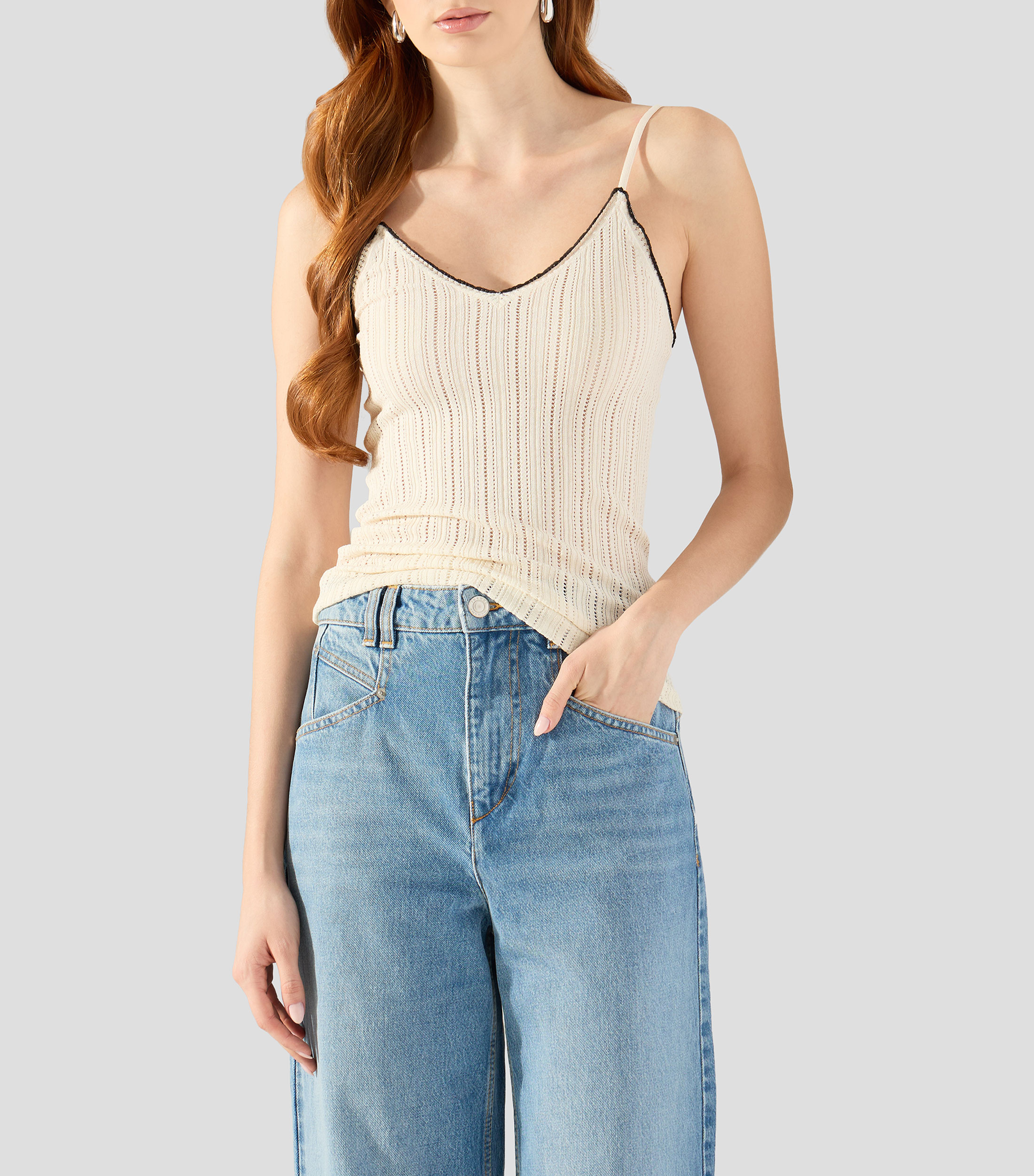 Blusa lisa sin mangas Mujer