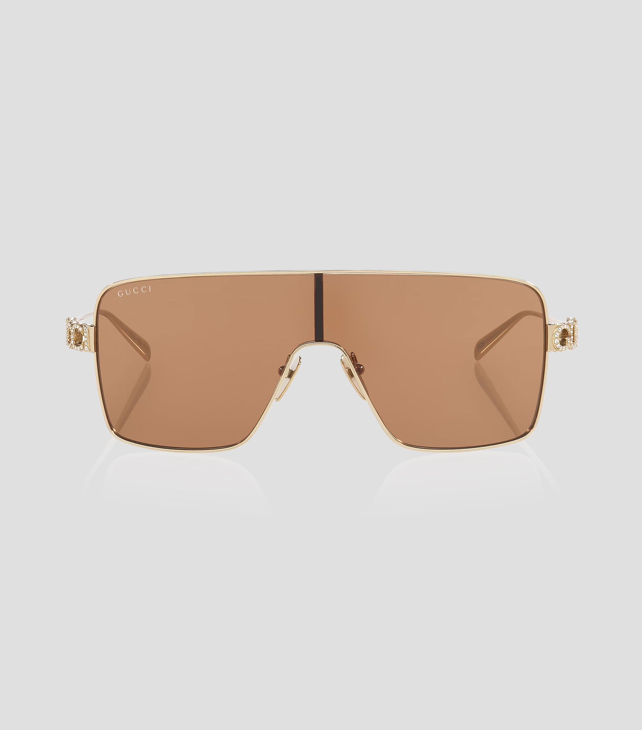 Lentes de sol irregulares dorados Mujer