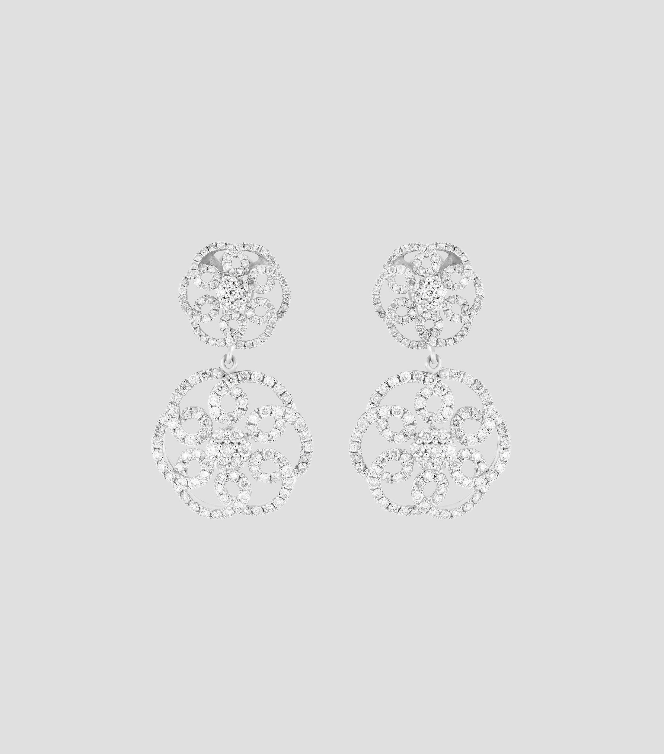 Aretes en oro blanco de 18 kilates con diamantes Mujer