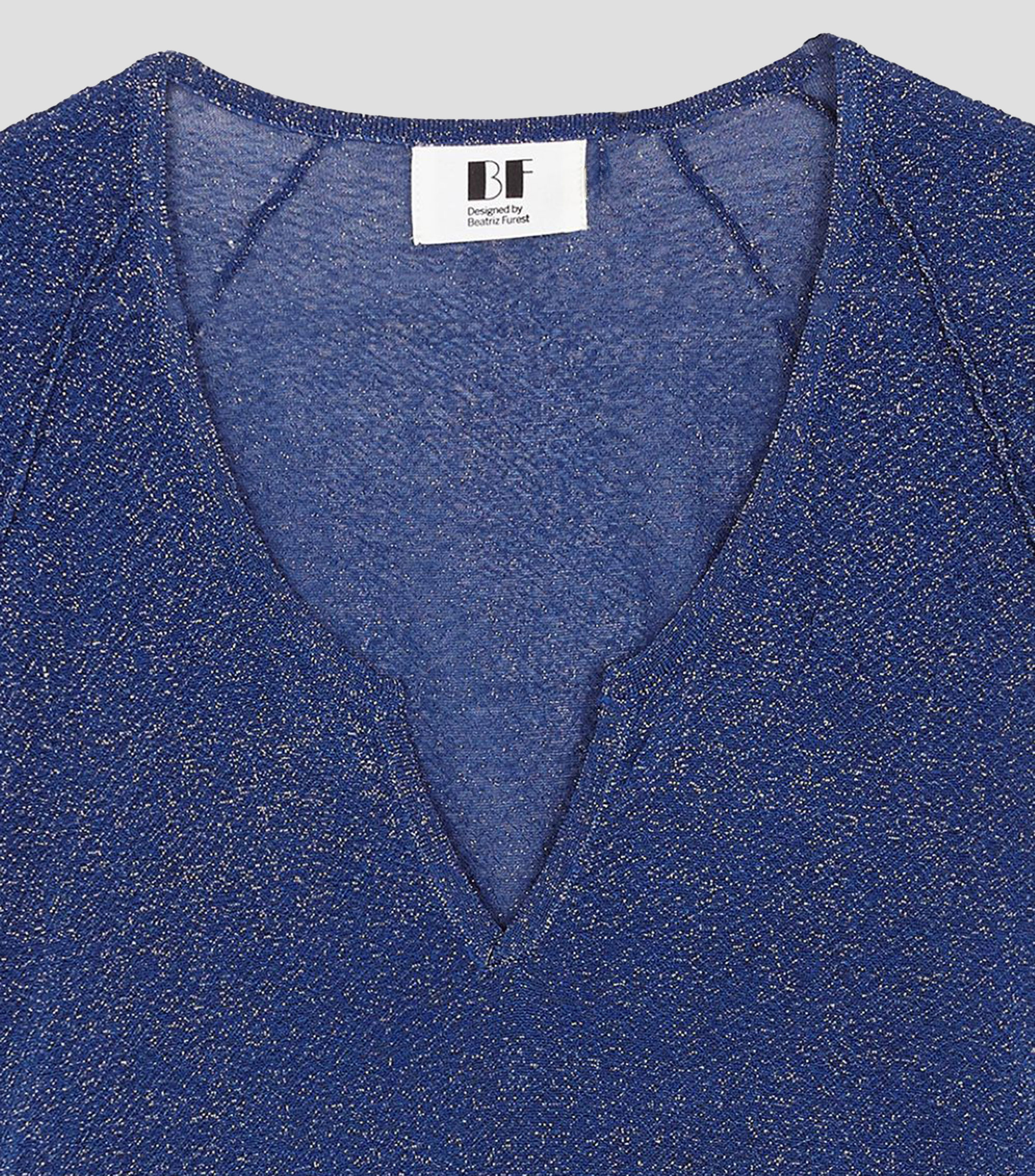 Blusa lisa sin mangas Mujer