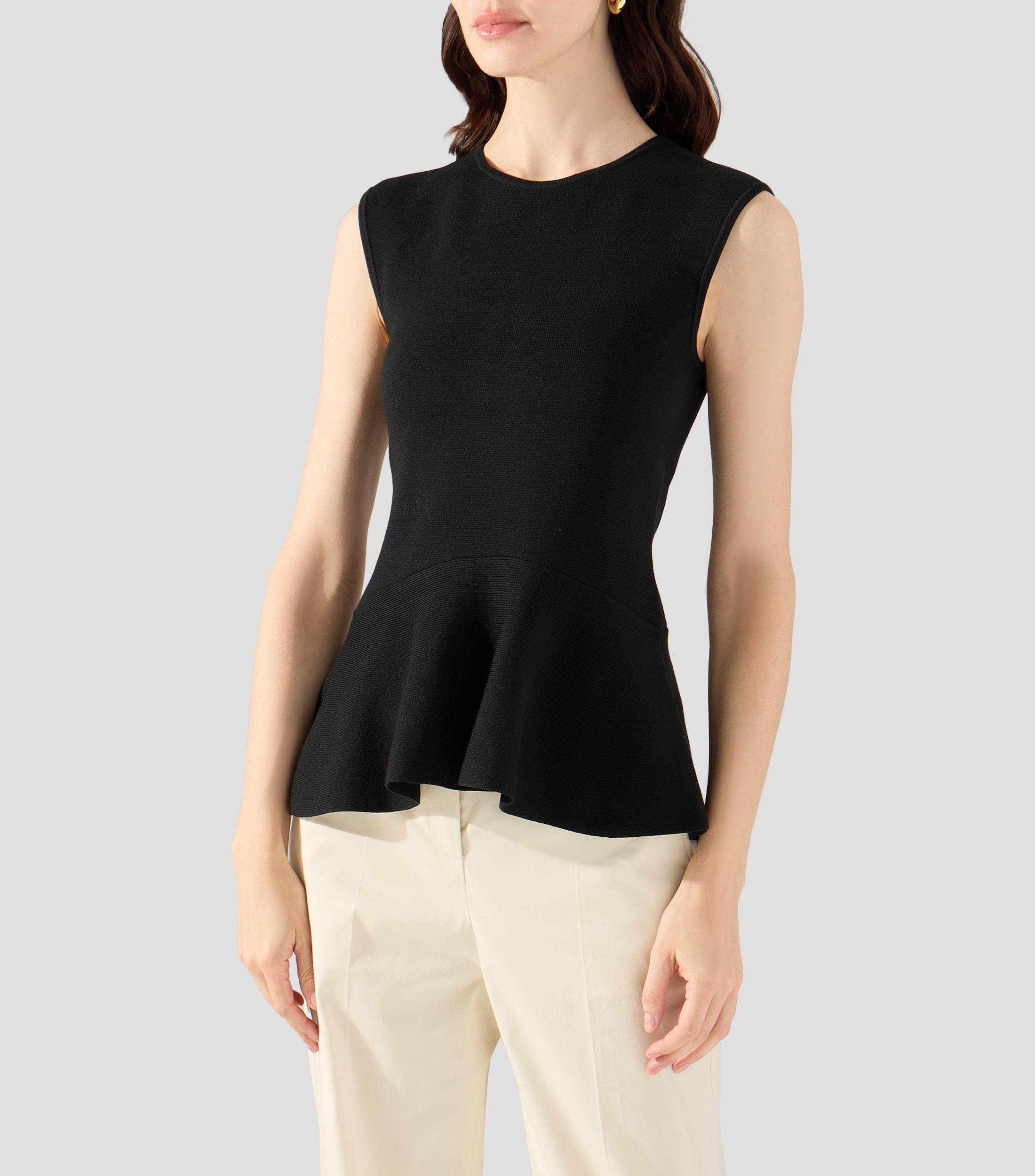 Blusa sin mangas con dobladillo de péplum Mujer