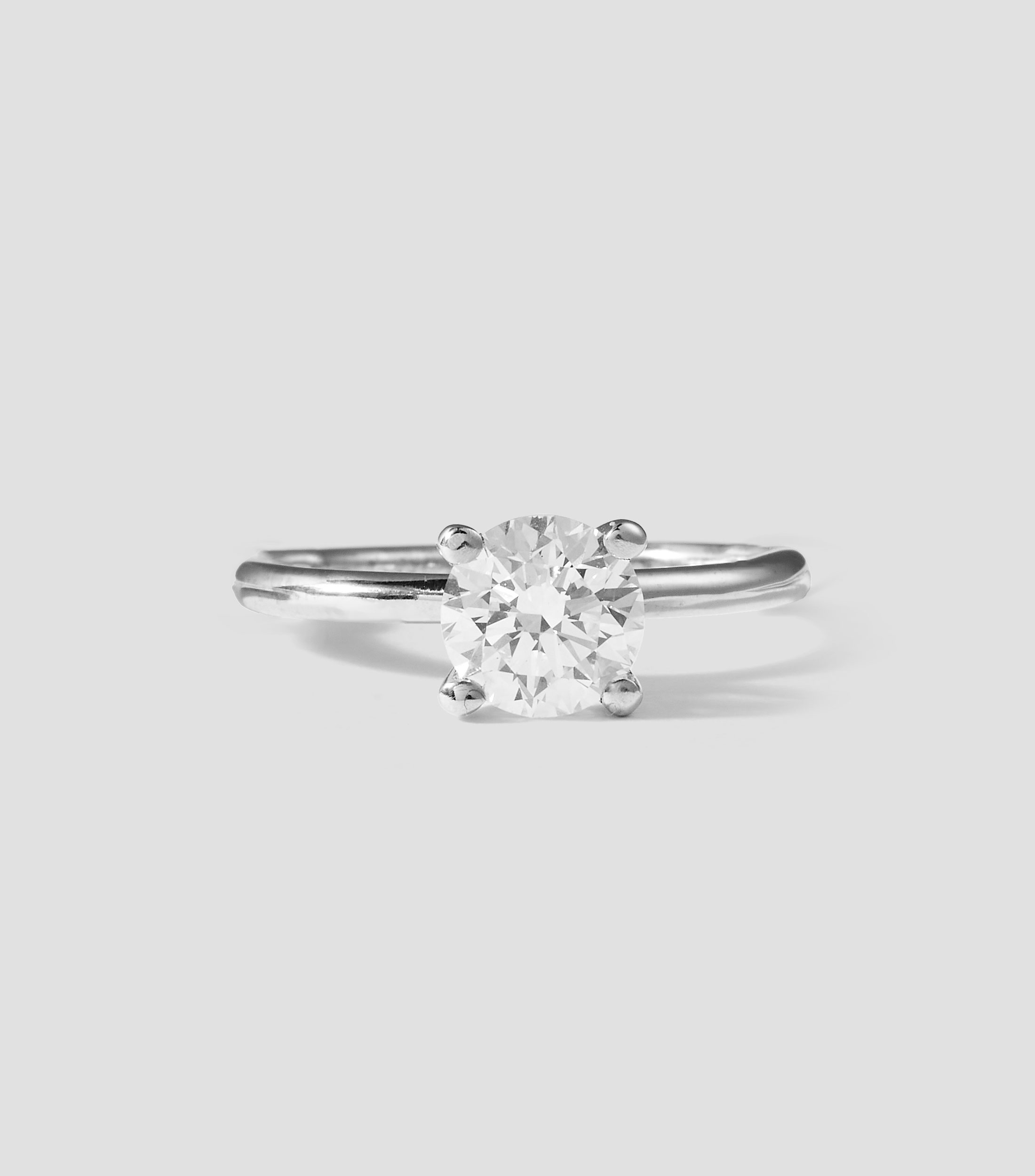 Anillo solitario en oro blanco de 14 kilates con diamante Mujer
