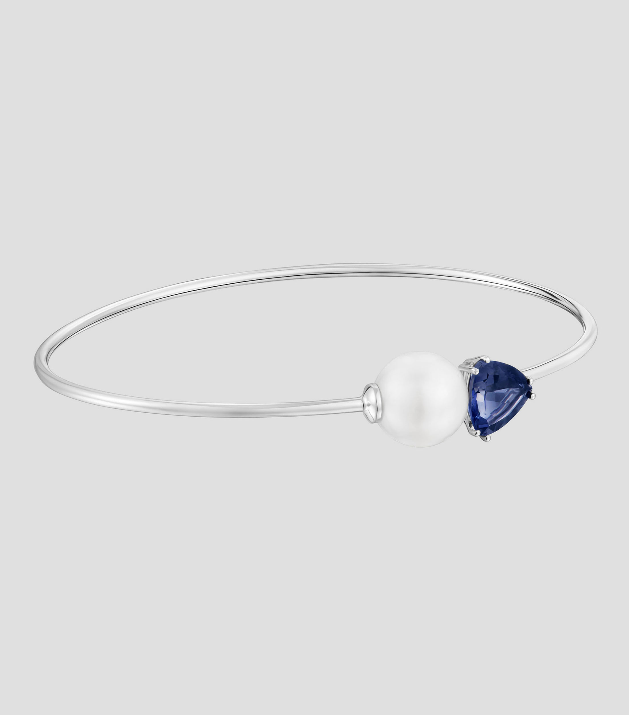 Pulsera en oro blanco 18 kilates perla y lolita azul Ivette Mujer