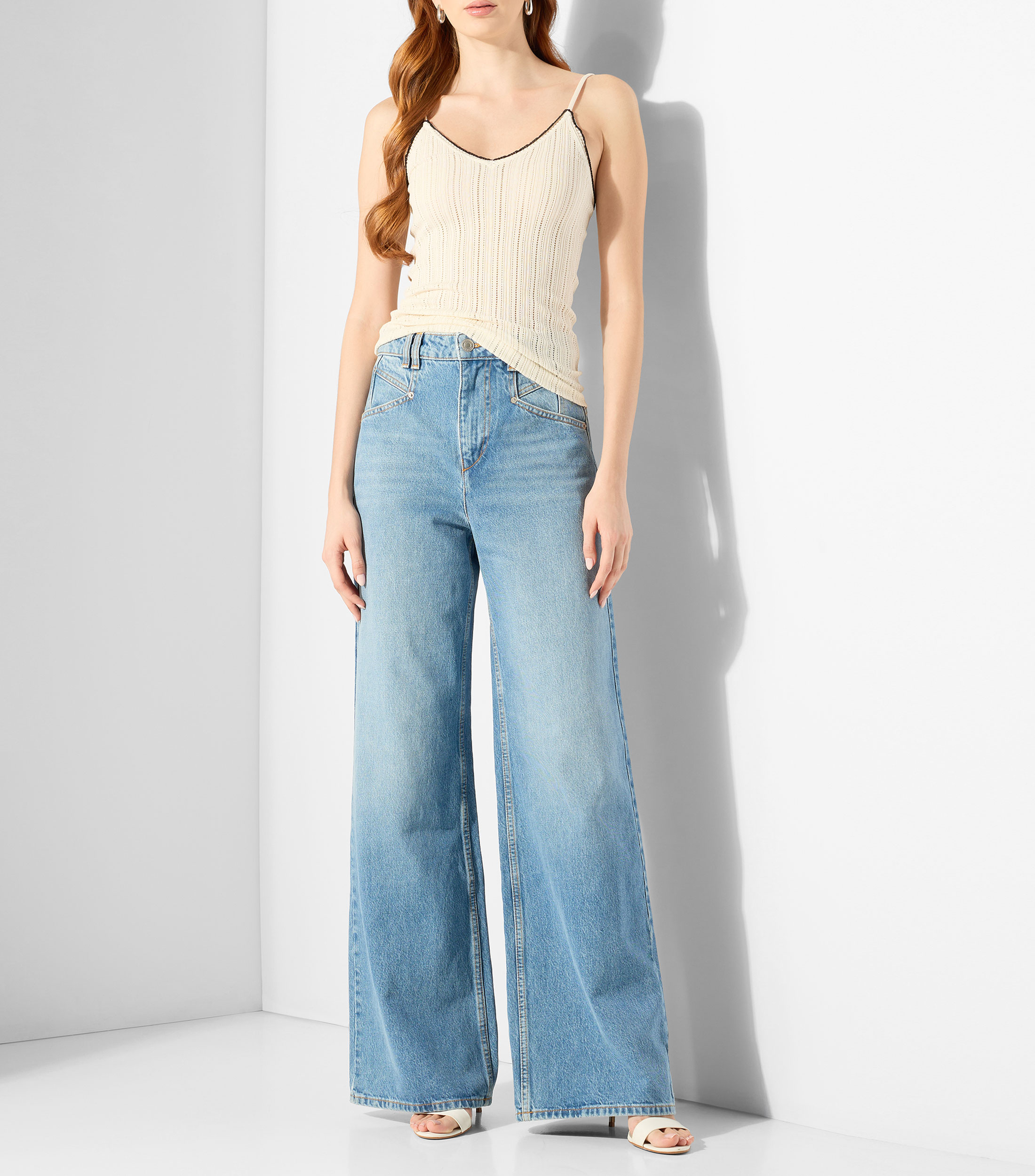 Blusa lisa sin mangas Mujer